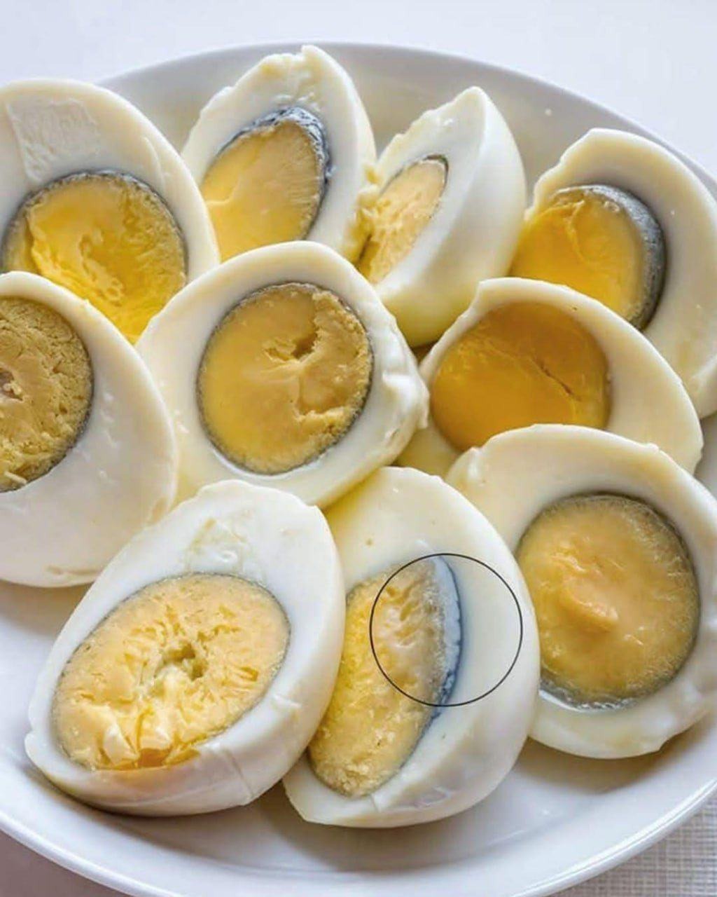 Why is the yolk of my hard-boiled egg turning green?
