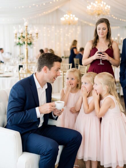 A Widowed Man Sat Alone at a Wedding Until Three Little Girls Whispered, “Just Pretend You’re Our Dad So Our Mom Won’t Sit Alone” — What Began as a Favor Became the Family He Never Planned For