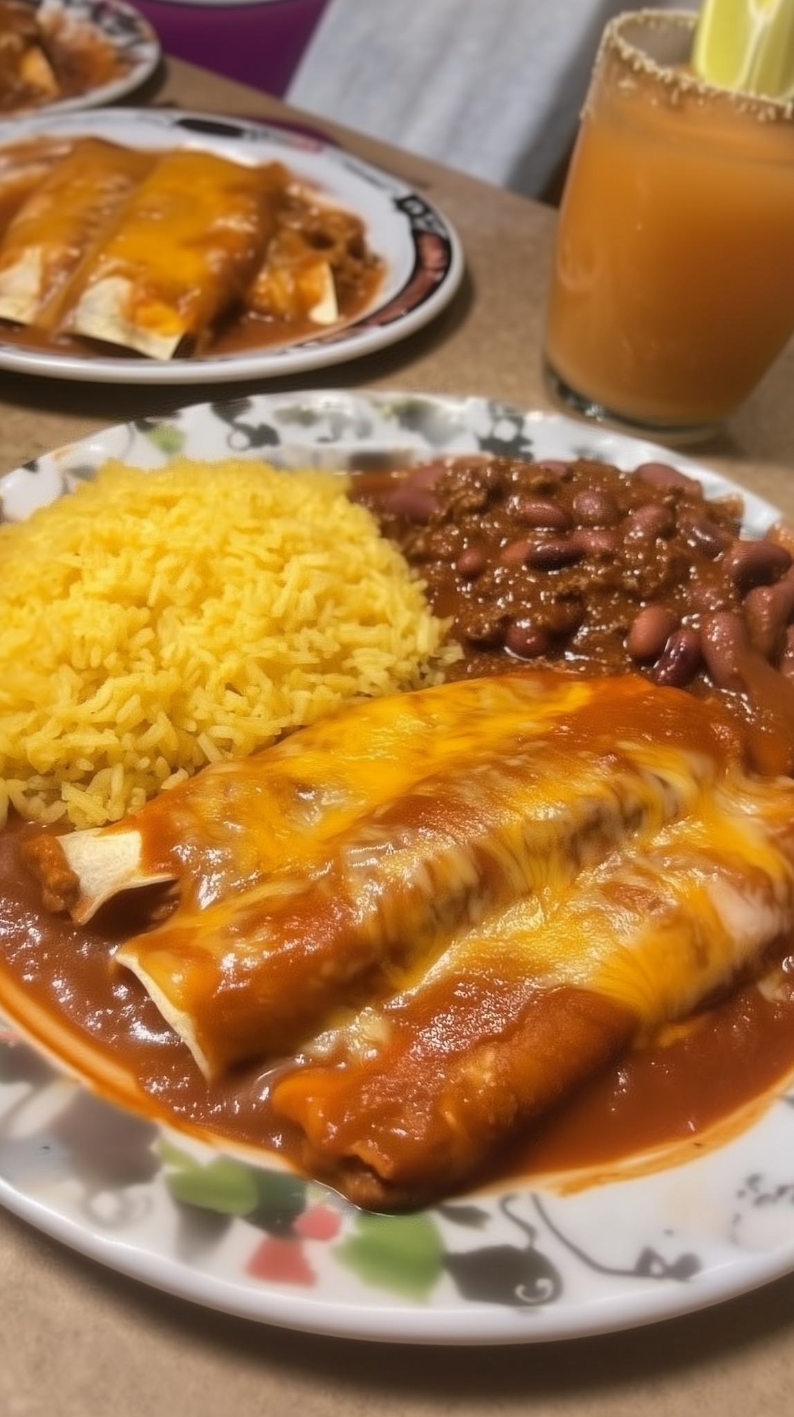 Two Cheese Enchiladas with Chile Con Carne Sauce; All Beef Tamale